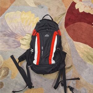 McKinley Black and Red Men's Adventure Backpack
